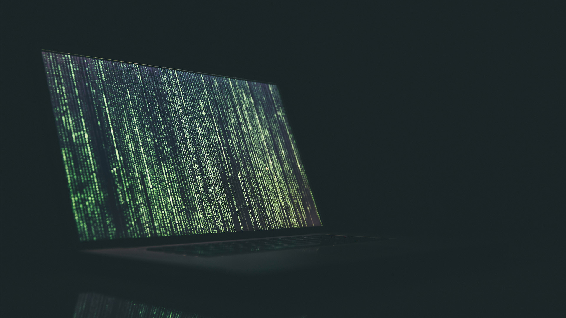 Laptop with coding on screen