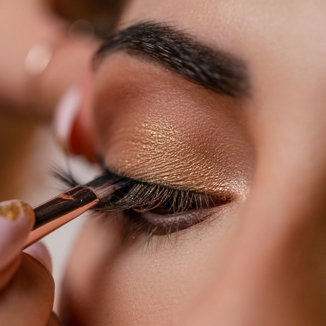 Close up of eyeshadow being applied to woman