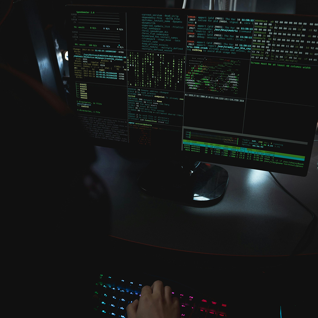 Hands typing on a keyboard with graphic associated with security such as a padlock