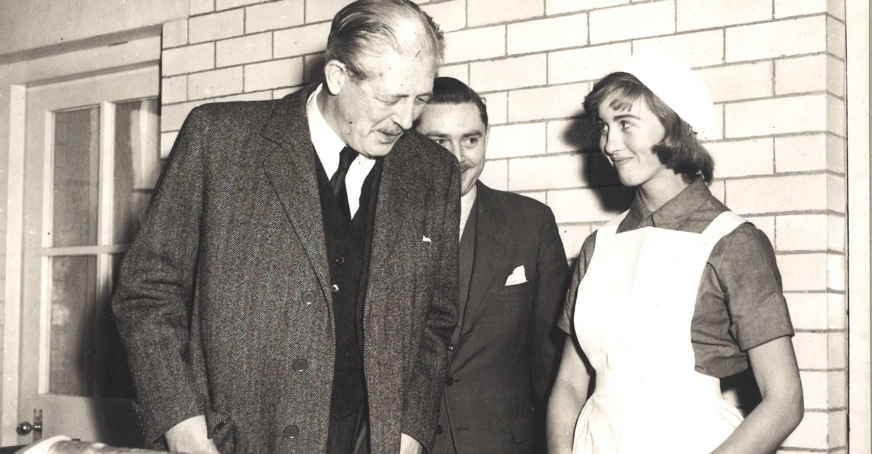 Former Prime Minister Harold Macmillan meeting student Miss Judy Brazier in the 1950s