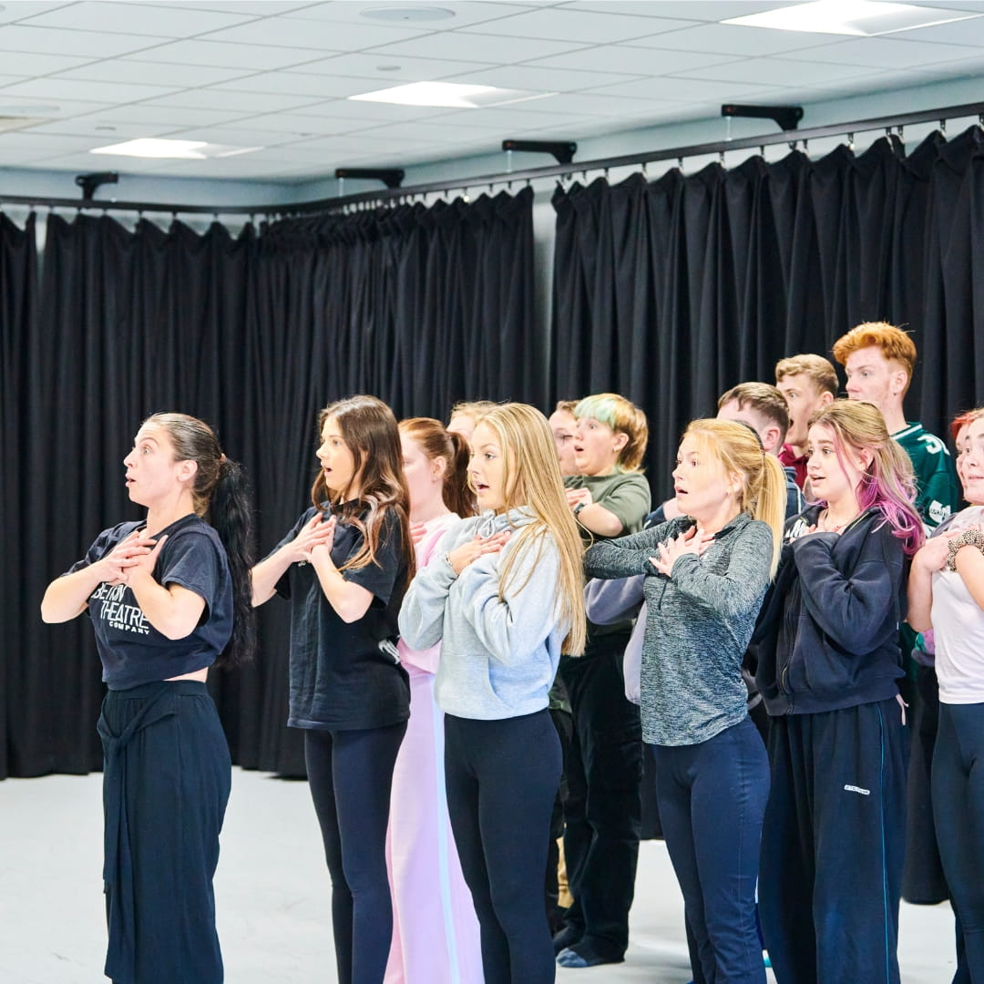 Group of student pulling expressive faces
