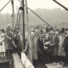 Black and white photo of the foundation stone being placed in 1936