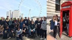 A large group of students stood in front of the London Eye and next to a red phone box