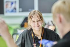 Student smiling at someone off camera